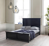bedroom view of Natalie Black 4-Piece Queen Bedroom Set bed