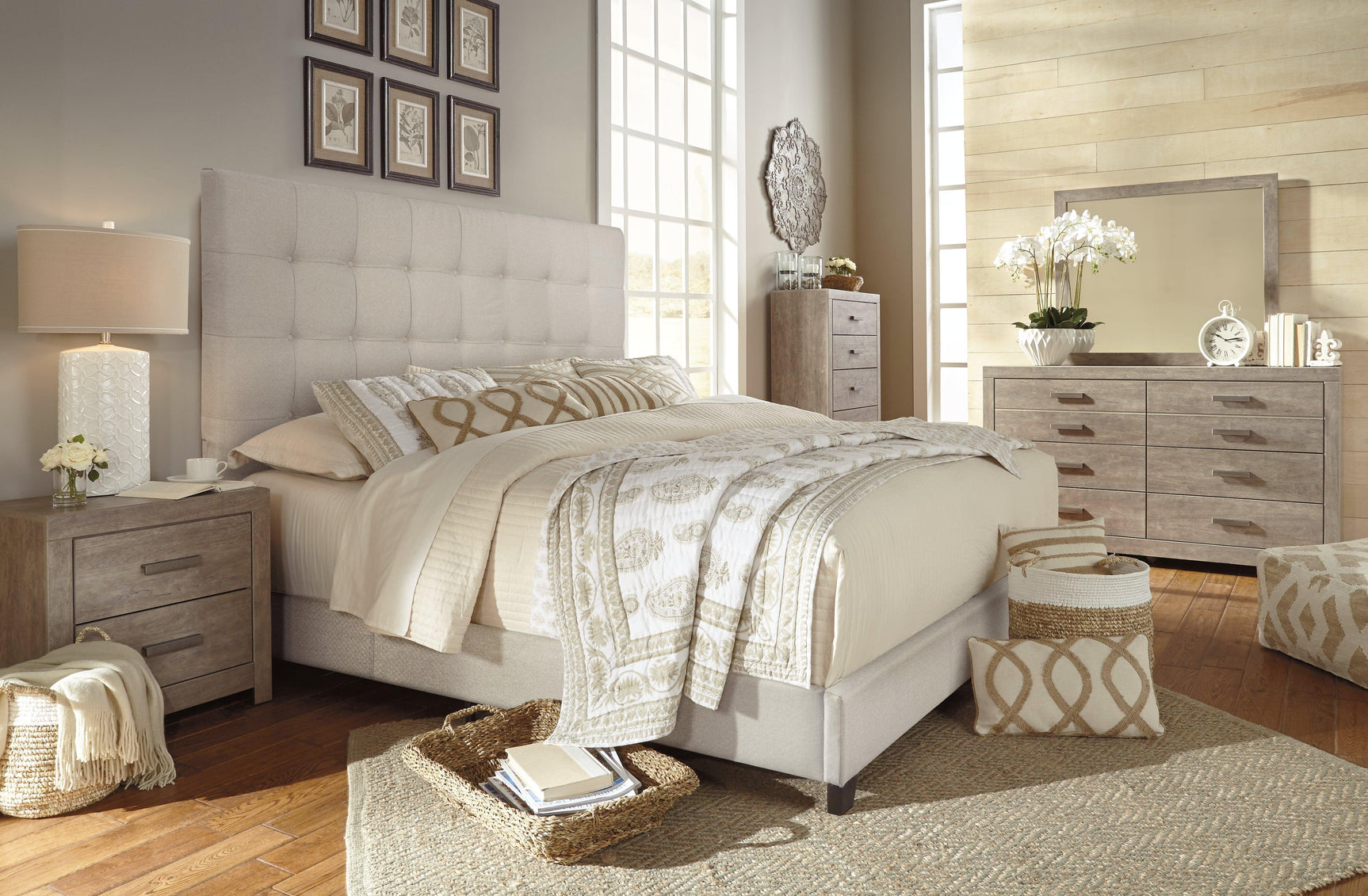 Dolante Beige King Upholstered Bed assembly parts behind headboard