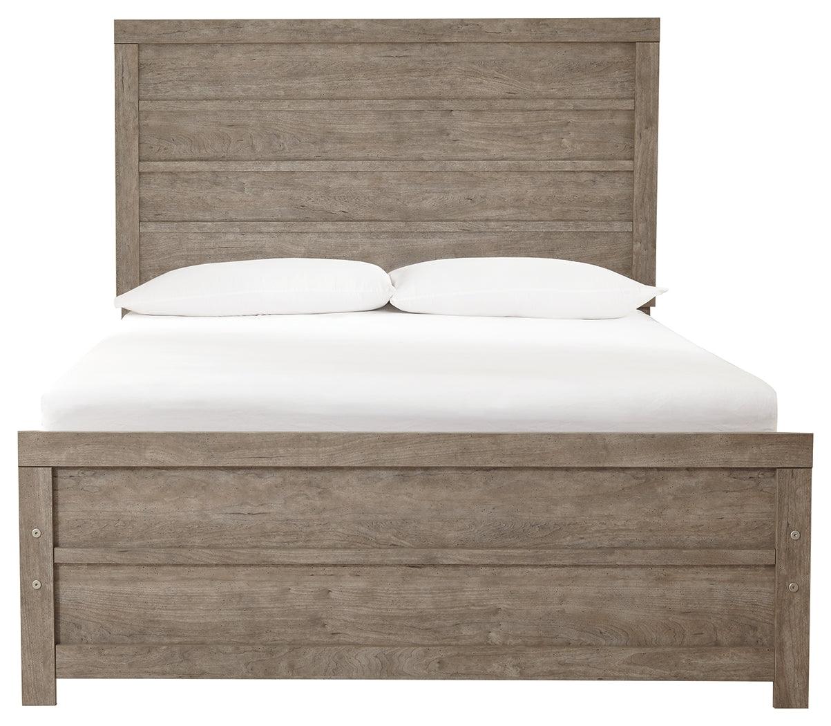 Head-on view of the gray full panel bed