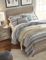 Low-profile footboard of Culverbach Gray Queen Panel Bed