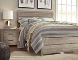 Close-up of vintage warm gray laminate finish on Culverbach bed