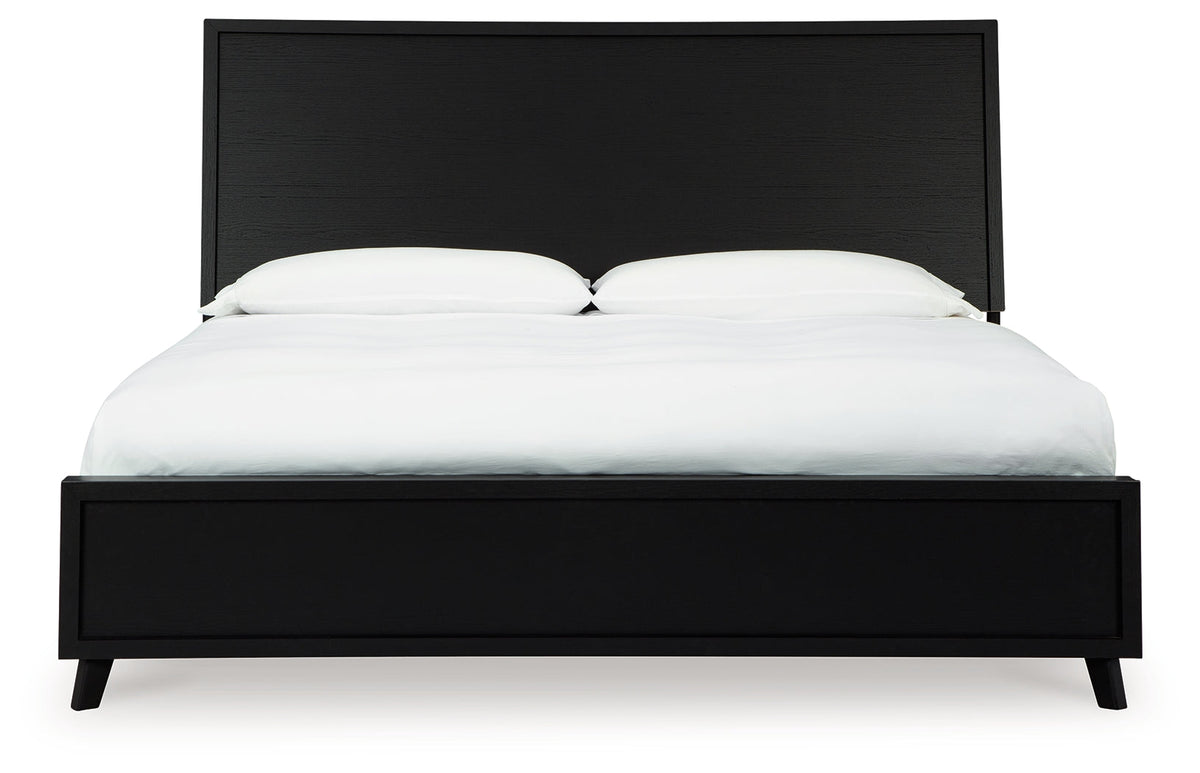Danziar black queen panel bed close up of headboard