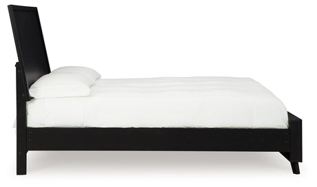 Danziar black queen panel bed side view