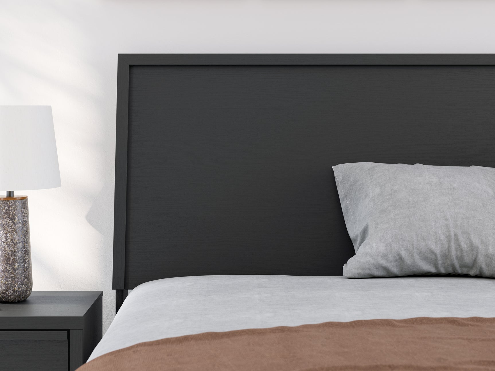 Danziar Black Full Panel Bed headboard front angle