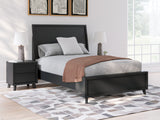 Danziar Black Full Panel Bed full view in room