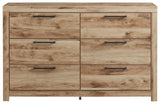 Close-up front view of Hyanna Tan Dresser showing wood grain finish