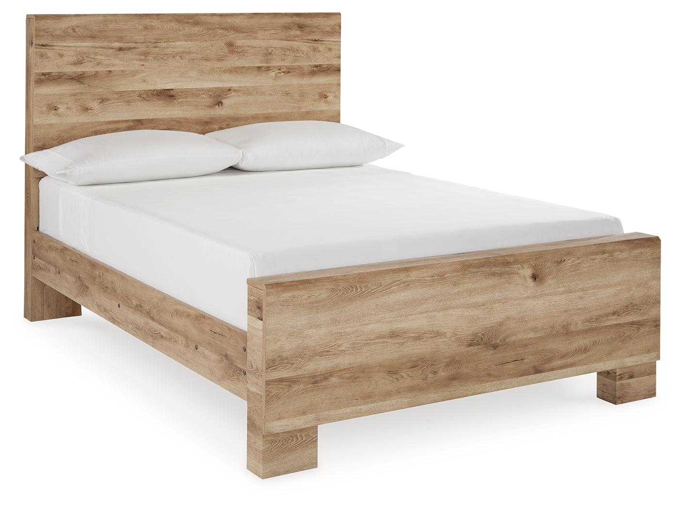 Hyanna Tan Brown Full Size Panel Bed close up on footboard