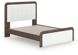 Close-up of faux leather upholstered headboard with ambient lighting
