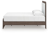 Headboard corner showing rounded edges and ambient light switch