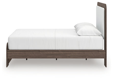 Headboard corner showing rounded edges and ambient light switch