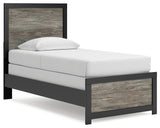 Side view of Broachmyn Twin Panel Bed highlighting black and gray two-tone finish