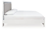 Side view of Maeling White King Upholstered Panel Bed