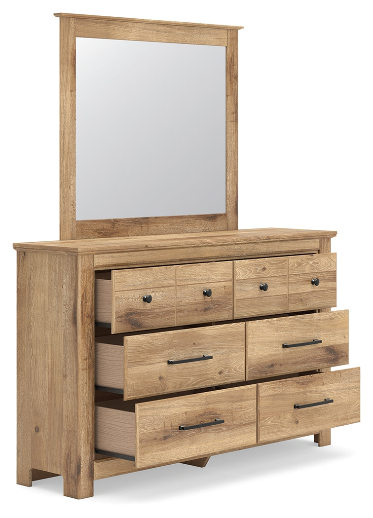 Open drawer of Makidern dresser showing storage space