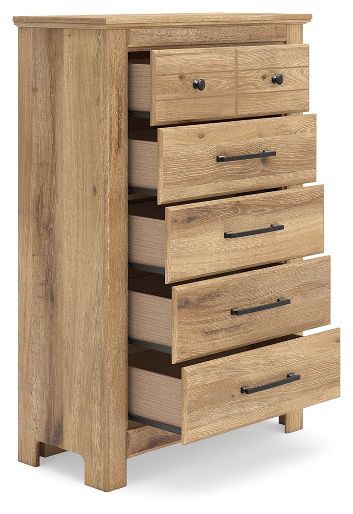 Open drawer on Makidern Chest of Drawers showing interior