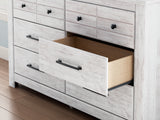 Close detail of Makidern Dresser drawer hardware