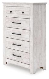 Side angle of Makidern whitewash chest of drawers