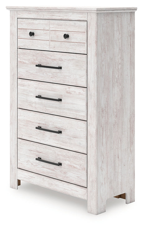 Side angle of Makidern whitewash chest of drawers