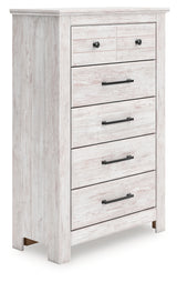 Makidern chest of drawers angled front view showing whitewash finish
