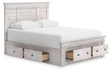Makidern Whitewash Queen Panel Storage Bed angled view
