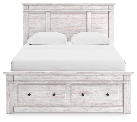 Head-on view of Makidern queen panel storage bed