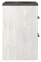 Back view of Gerridan nightstand showing sturdy build