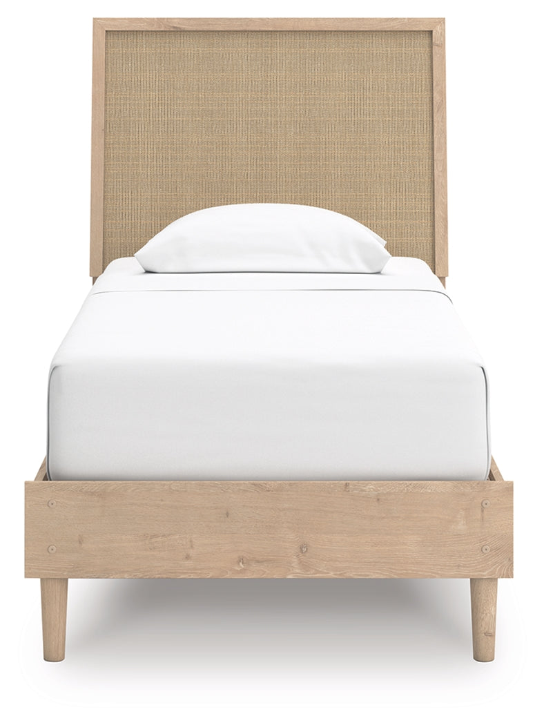 Cielden Twin Panel Bed showing oak grain finish on footboard