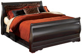 Elegant black sleigh bed headboard detail