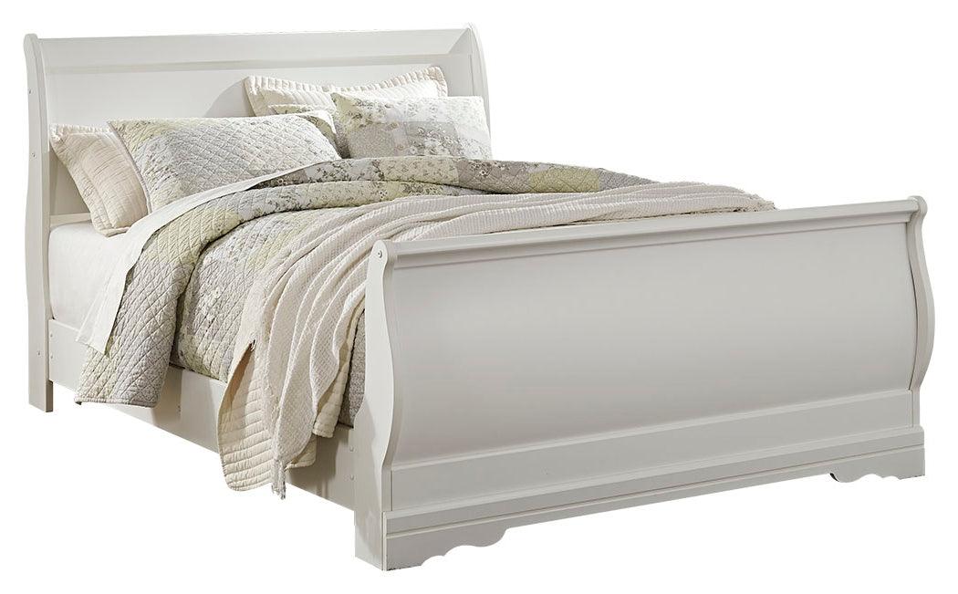 Close-up of carved details on Anarasia Sleigh Bed headboard