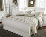 Anarasia White Queen Sleigh Bed shown in bedroom setting
