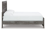 Bronyan queen bed side angle with four storage drawers visible
