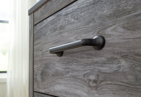 Framed front and pilasters on Bronyan Dark Gray dresser