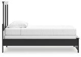 Maribel Black Twin Panel Bed styled with bedding