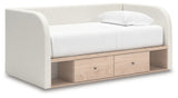 Side angle view of Arloster full upholstered day bed with storage drawers