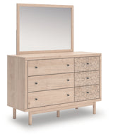 Angled side view of Arloster Tan Dresser showing oak grain finish