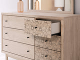 Fabric-lined drawer interior of Arloster Dresser