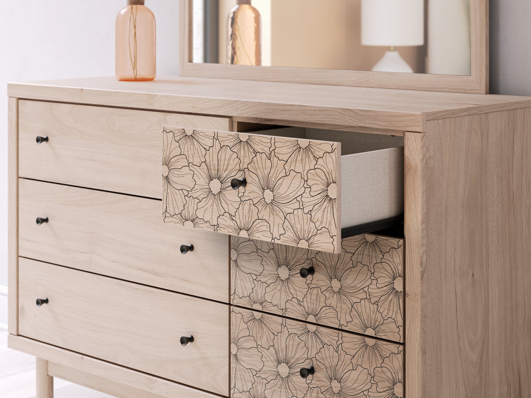 Fabric-lined drawer interior of Arloster Dresser
