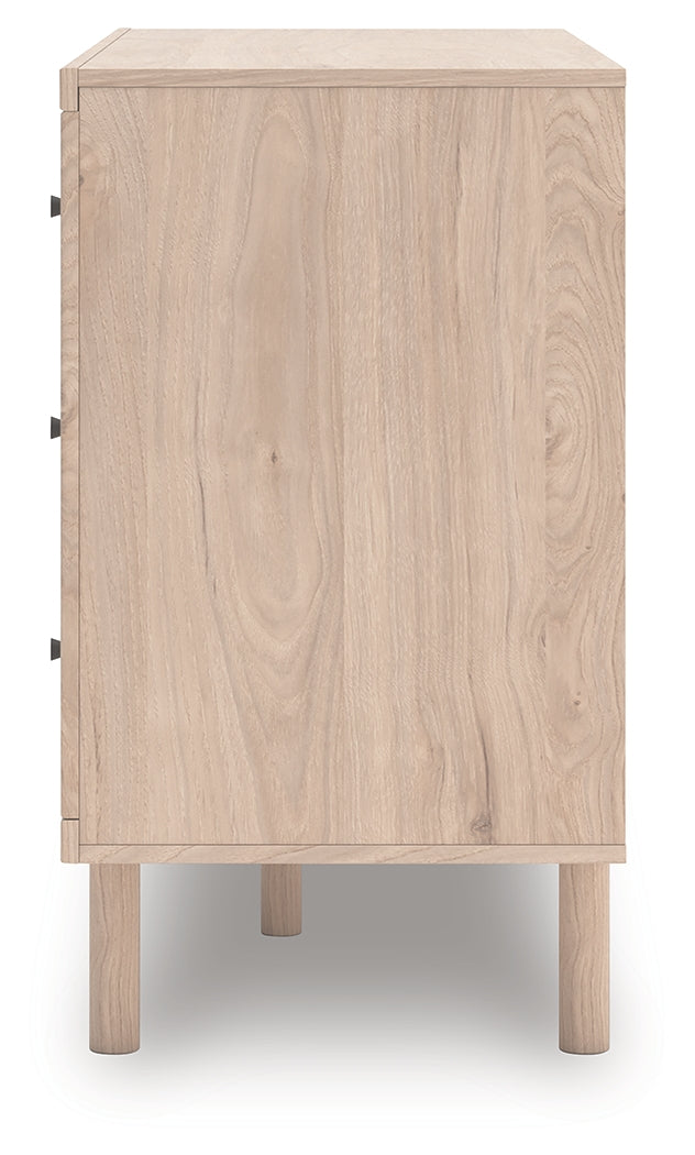 Close-up of light tan laminate finish and wood texture
