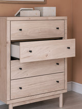 Arloster Tan Chest of Drawers wood grain and knob detail