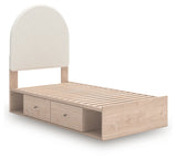 Open storage drawers under Shapella twin bed revealing interior lined with faux linen laminate