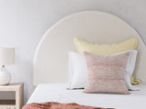 Close-up of upholstery texture on headboard