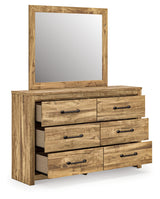 Open drawer showing interior storage of Maystonna Dresser