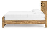 Close-up of bed's wooden grain finish