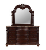 Side view of Stanley King Sleigh Bed tufted footboard and wood frame