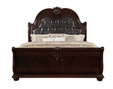Bedroom view of Stanley Cherry Brown fabric upholstered tufted sleigh bed