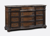 side view of Stanley Coffee Brown Upholstered Tufted Sleigh Bedroom Set bed