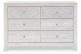 Paxberry whitewash dresser close-up of medallion drawer pull