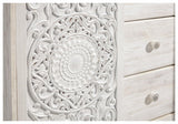 Detailed close-up of whitewash finish and hardware