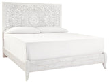 Paxberry Whitewash King Panel Bed angled side view showcasing footboard