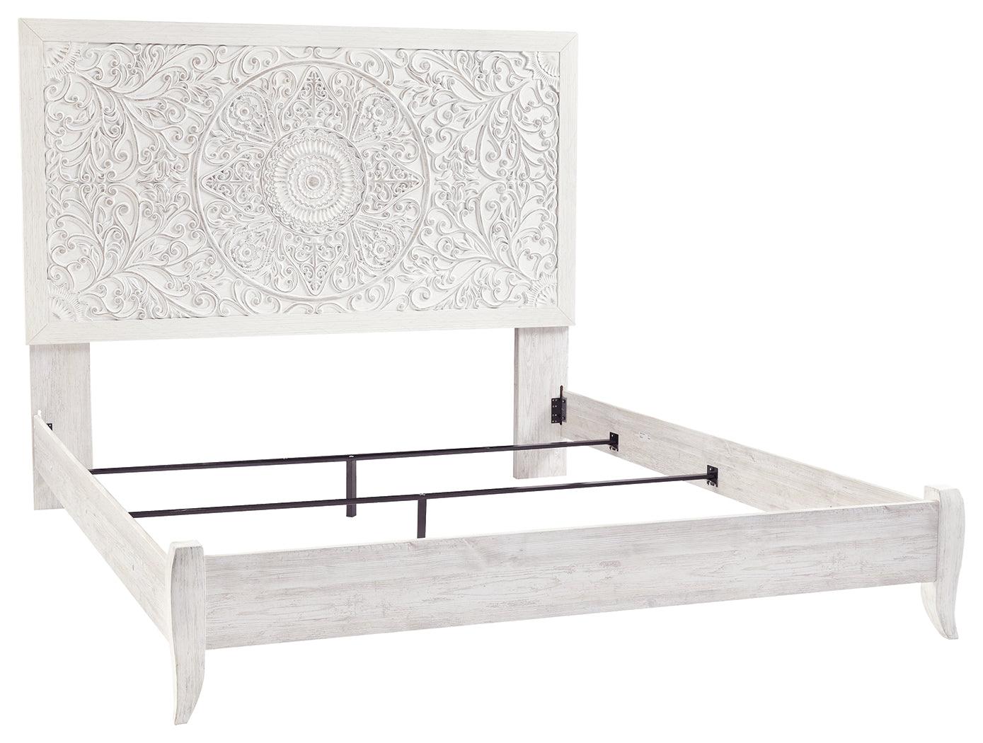 Side angle of Paxberry King Panel Bed showing footboard and rails