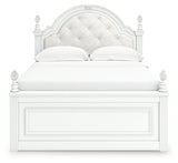 Close-up front view of Kozlani upholstered headboard with beading and ball tops